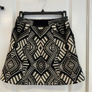 Alice + Olivia Mini Skirt- Black, Cream & Gold Detail with pockets. Back Zipper